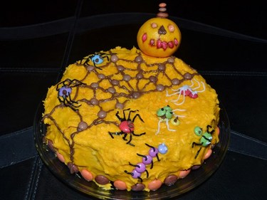 Smarties orange chocolate spider and creepy crawlies Halloween cake