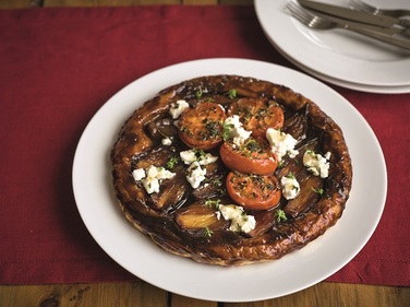 Shallot tart tatin with roasted tomatoes and goats cheese