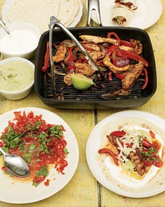 Chicken fajitas with homemade guacamole and salsa