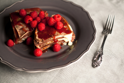 Chocolate pancakes with raspberries 