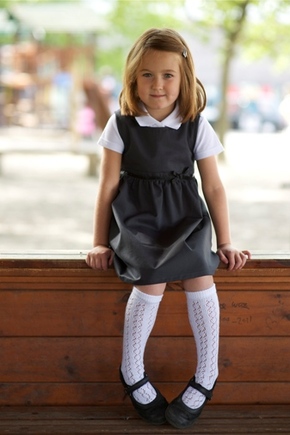 School Pinafore with a Coconut Shell Button from £16.95