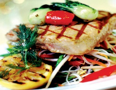 Tuna loin fillets with a sesame-dressed salad and wilted pok choi