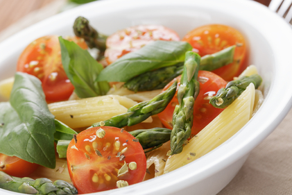 Asparagus, peas with cherry tomatoes and penne pasta