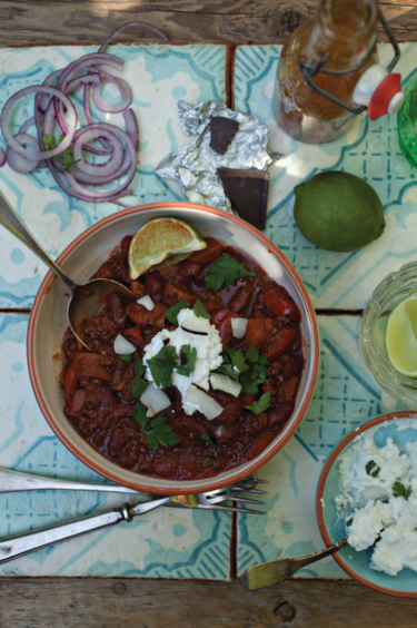 Chocolate chilli con carne with coconut yoghurt and jazzy onions