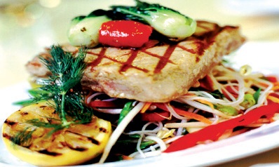 Tuna loin fillets with a sesame-dressed salad and wilted pok choi
