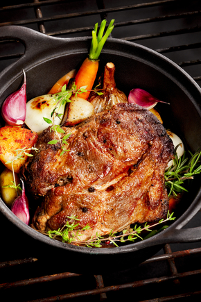 Pot roast pork with herbs and new carrots