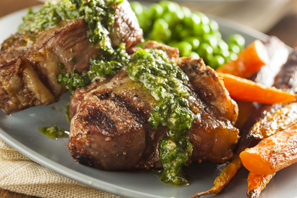 Lamb chops with herb pesto and roast carrots
