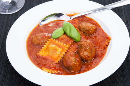 Slow cooked ragu and cheese ravioli with meatballs