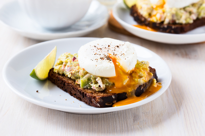 Guacamole on toast with poached eggs  