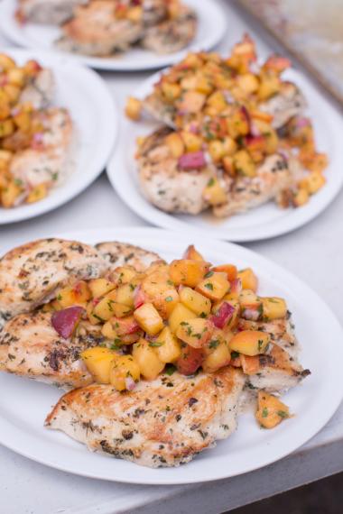 Pan fried chicken breasts with peach salsa