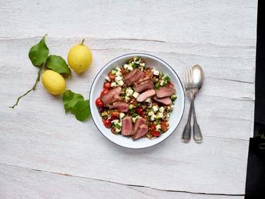 Greek salad with lentils and lamb