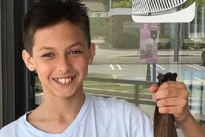 11-year-old boy defies gender stereotypes to donate long hair to charity