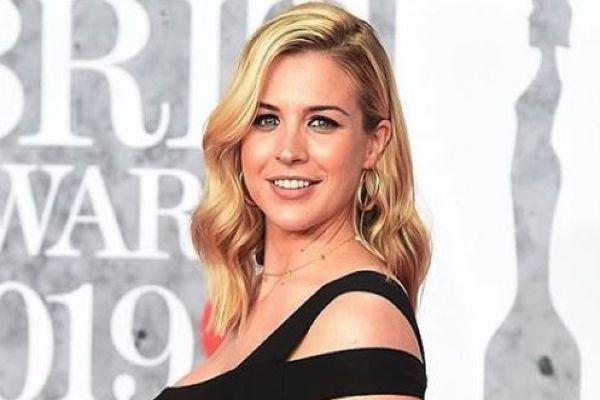 Mum-to-be Gemma Atkinson shows off her blooming baby bump at the BRITs