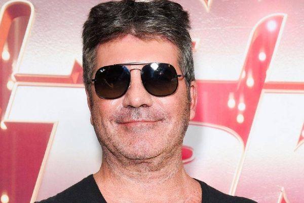 Simon Cowell just posted a snap of son Eric and he looks SO grown-up 