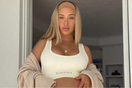 Model Tammy Hembrow shares sweet sibling moment after giving birth to baby girl
